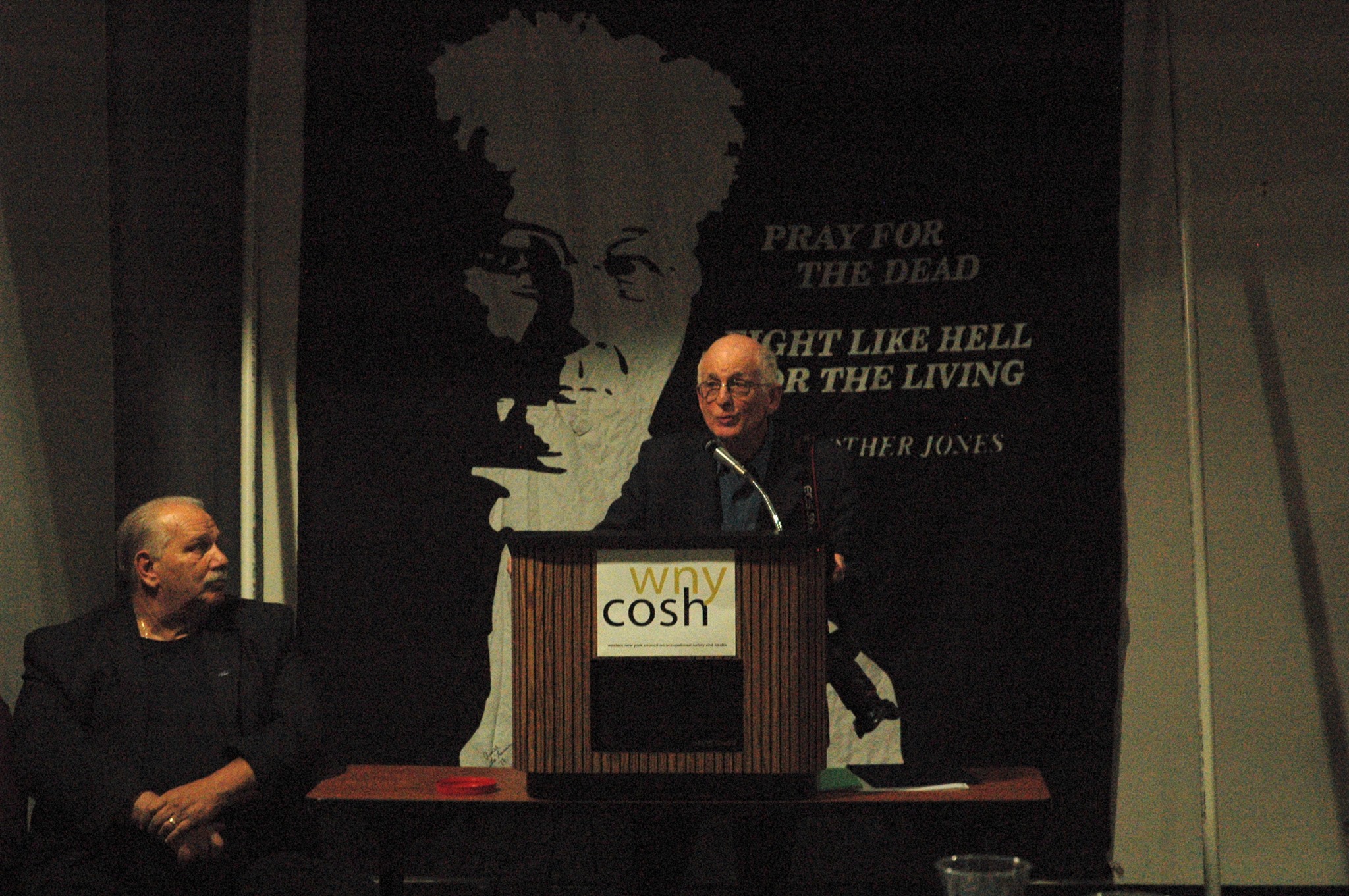 Earl Dotter, photographer, speaking at a WNYCOSH event